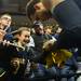 Michigan fan Will Morrison, 9, of Howell, smiles as he has a jersey signed by junior Jordan Morgan at the Palace on Tuesday, March 20, 2013 in Auburn Hills.  Melanie Maxwell I AnnArbor.com